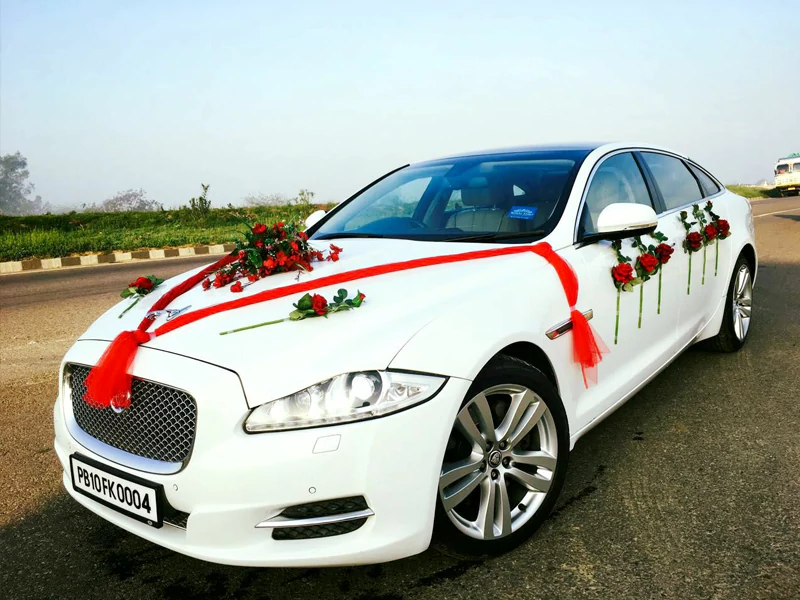 Hire White Color Jaguar XJL for Wedding 